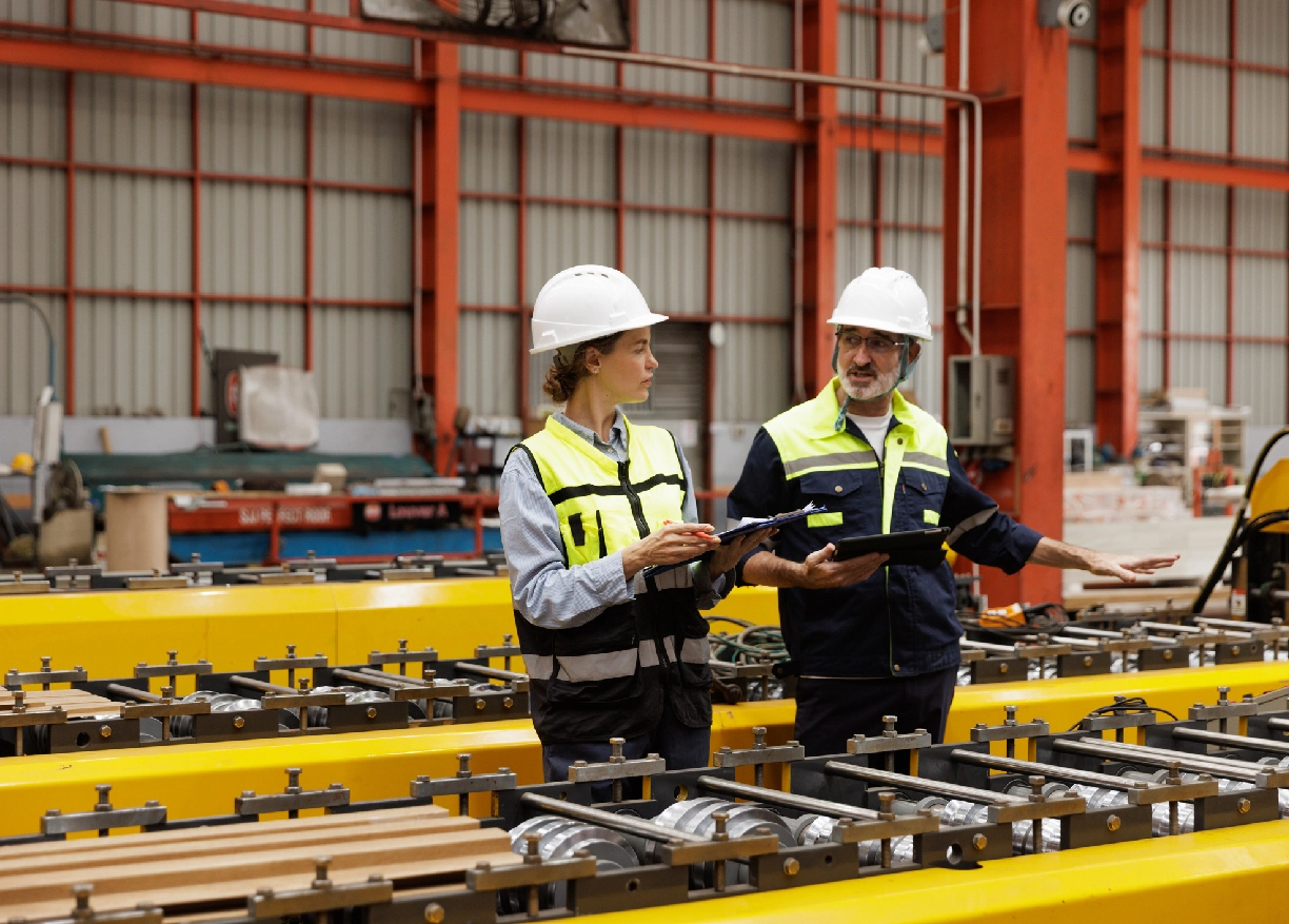 Engineers reviewing production line